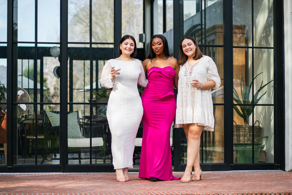 Candid full body portrait of girls at a fancy 21st birthday